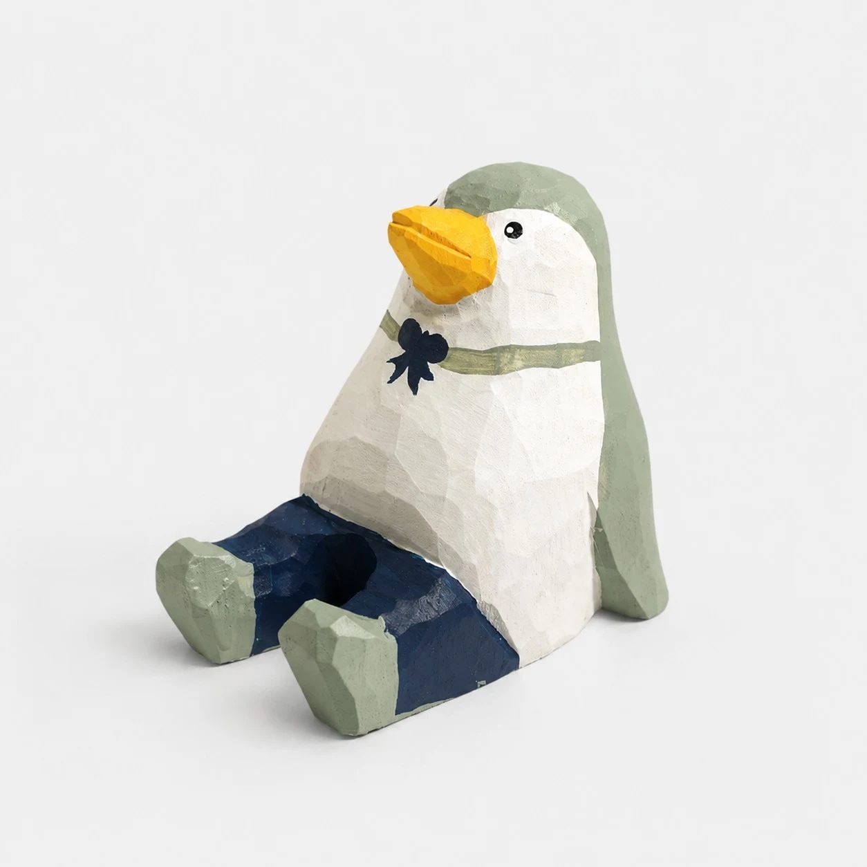 Hand-carved wooden animal phone stand